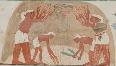 Ancient Egyptian workers winnowing — separating grain from chaff
