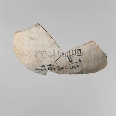 A bee hieroglyph marks the contents of this fragmented New Kingdom storage jar as honey. Found at the Palace of Amenhotep III, Malqata, Theb