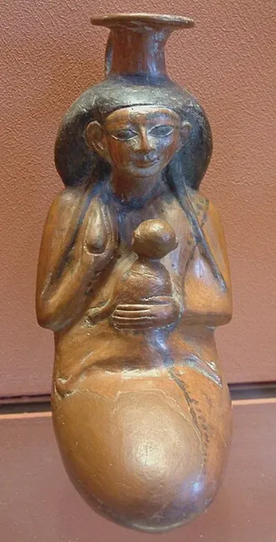 Terracotta pot depicting a woman kneeling and suckling a child (c. 1539–1425 BCE)