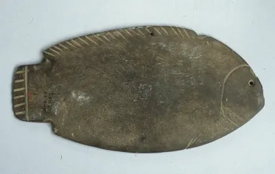 Fish palette made from greywacke (ca. 3300–3100 B.C.E). Southern Upper Egypt, Hierakonpolis (Nekhen), Fort Cemetery (Hk 27), Tomb 23