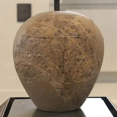 Ceremonial mace-head of King Scorpion, c. 3100 to 3000 BCE, from the Main Deposit at Hierakonpolis. The king wears the White Crown of Upper 