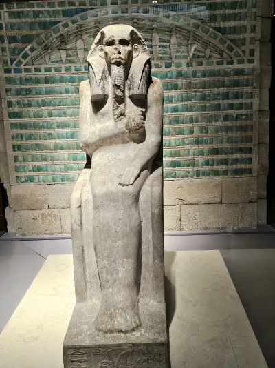 The seated statue of King Djoser, painted limestone, 3rd Dynasty (c. 2592 to 2566 BCE). Discovered in the serdab of his funerary complex at 